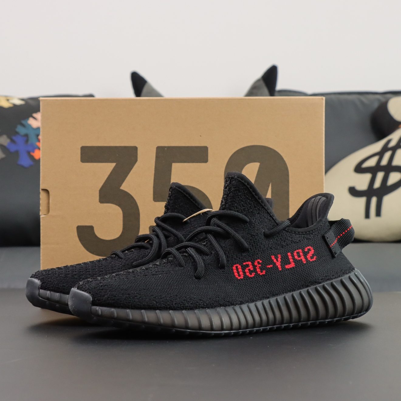 Yeezy 350 Bred reps with black Primeknit upper and shoebox