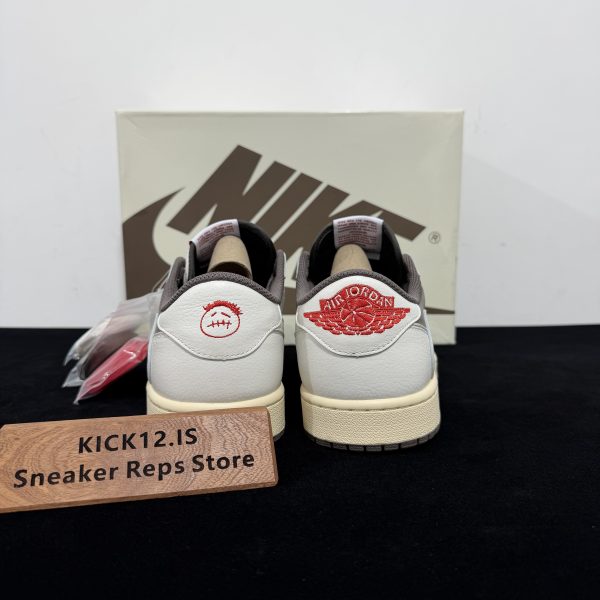 Back heel view of Travis Scott Reverse Mocha Reps with Wings logo