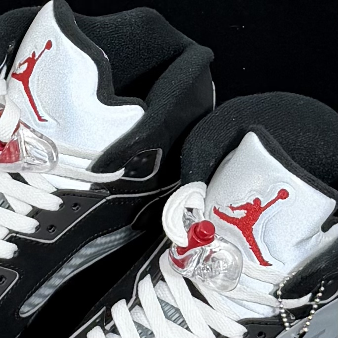Tongue logo detail on Jordan 5 Black Metallic Reimagined Reps