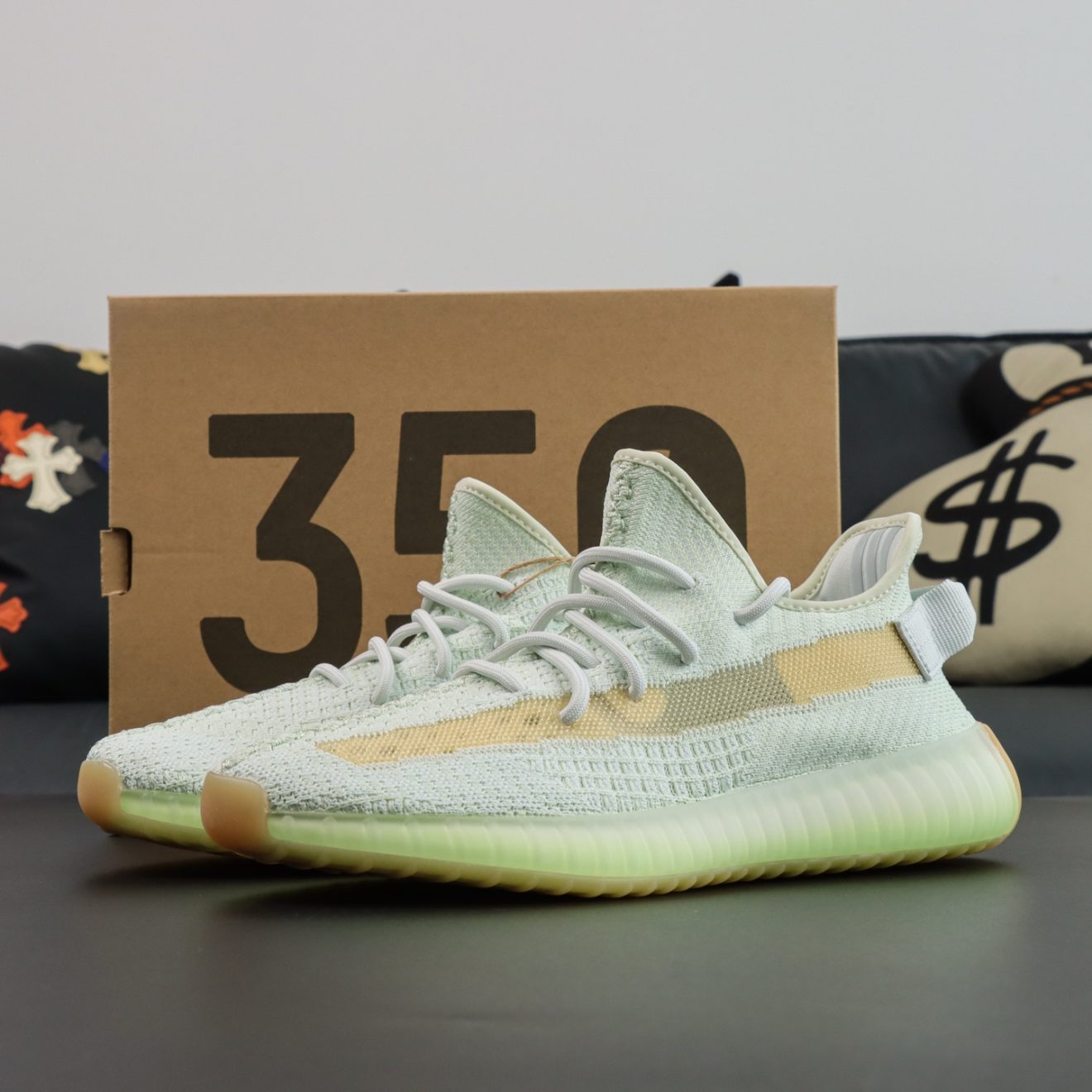 Yeezy 350 Flax reps with yellow-tinted upper and original box