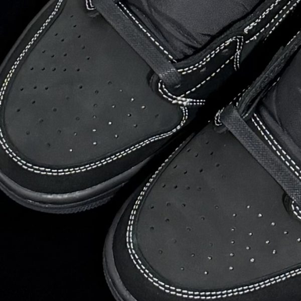 Close-up of toe box on Travis Scott Black Phantom Reps