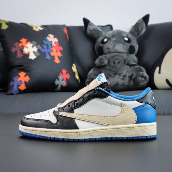 Side view of Travis Scott Fragment Design Jordan 1 Low reps with black overlays