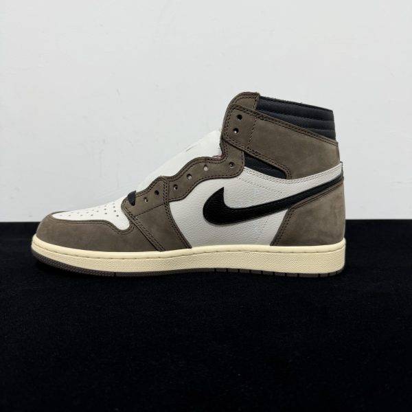 Medial side view of Travis Scott Jordan 1 High Mocha Reps with reverse Swoosh