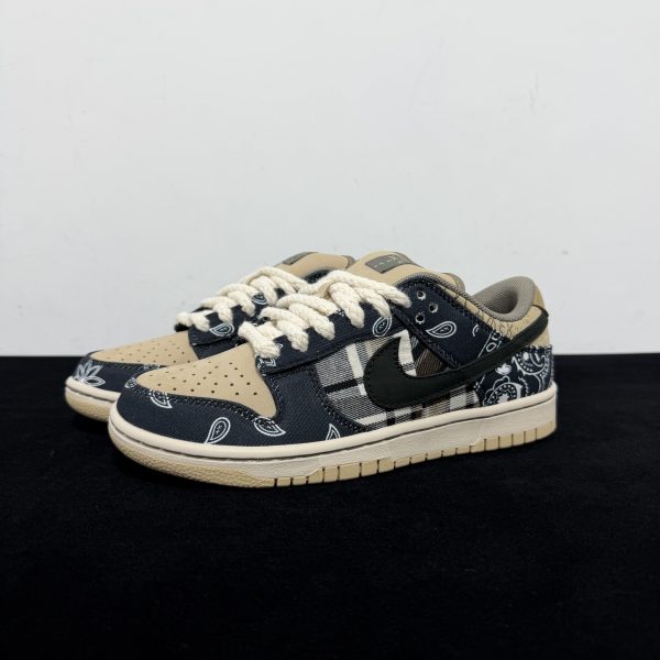 Side view of Travis Scott Dunk Jackboys Reps with patchwork design