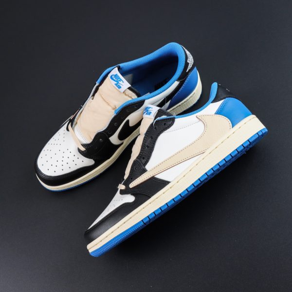 Top-down view of Travis Scott Fragment Design Jordan 1 Low reps showing reverse Swoosh and lace setup