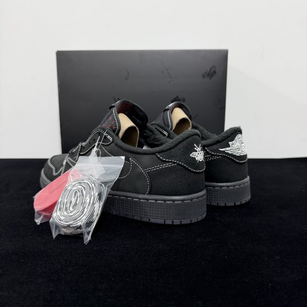 Rear angle view of Travis Scott Black Phantom Reps showing heel structure