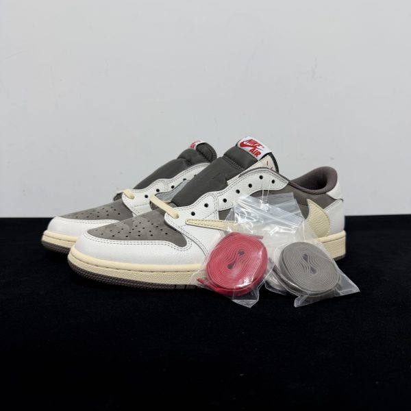 Side view of Travis Scott Reverse Mocha Reps with reverse Swoosh
