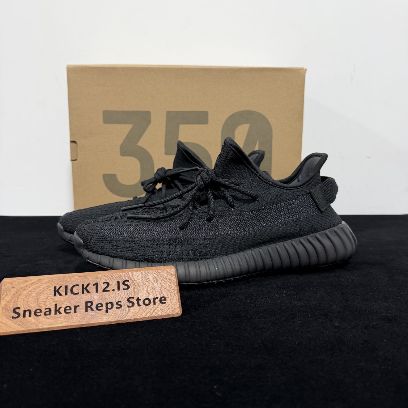 Yeezy 350 Onyx Reps with box displayed on table