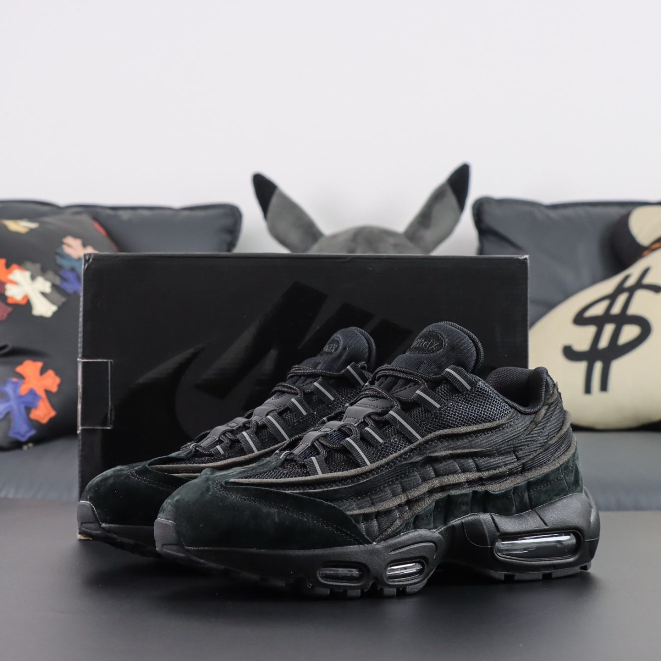 Air Max 95 CDG reps front view with sculptural layers and box
