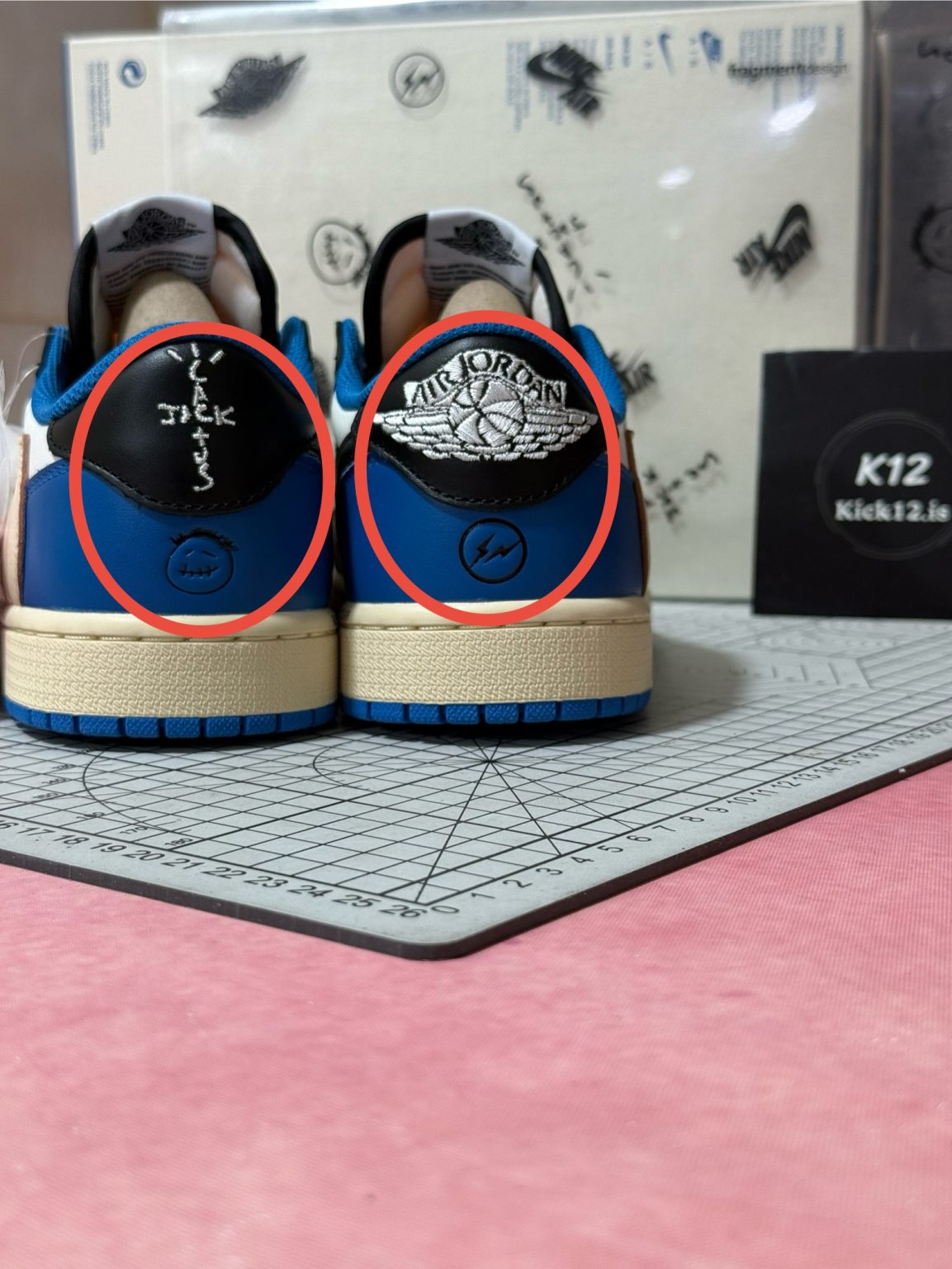 Travis Scott and Fragment co-branded heel and tongue logos on Jordan 1 reps