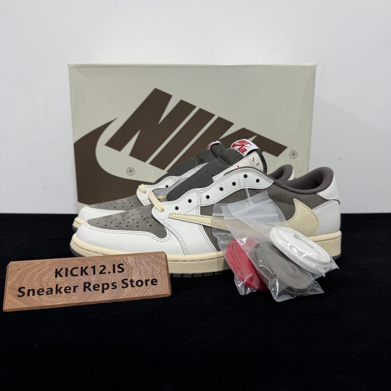 Travis Scott Reverse Mocha Reps with box displayed on table