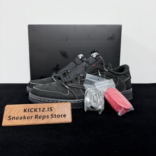 Travis Scott Black Phantom Reps with box displayed on table