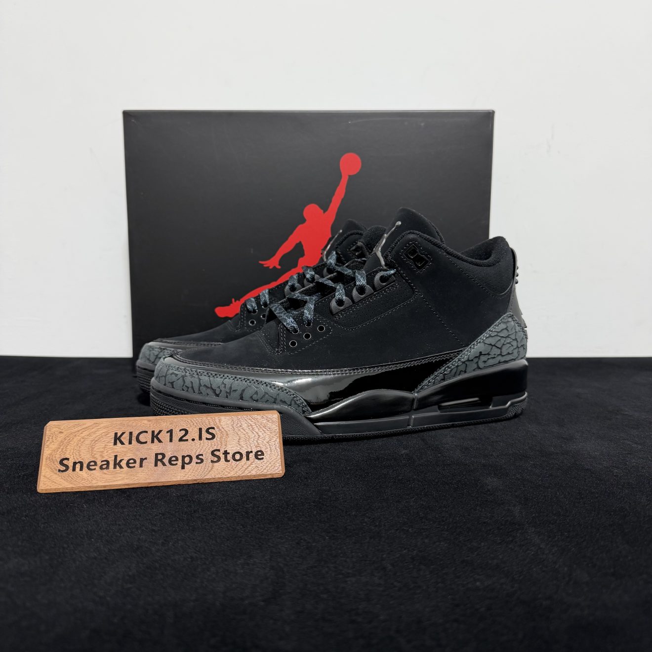Jordan 3 Black Cat Reps with box displayed on table