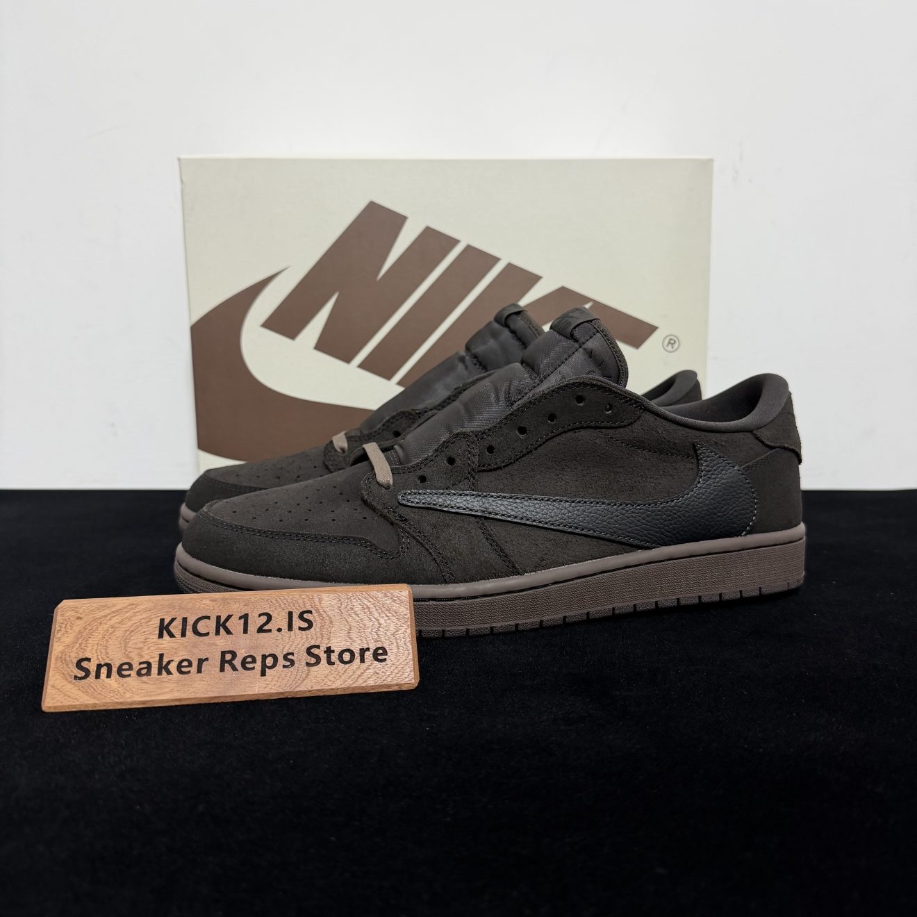 Travis Scott Velvet Brown Reps with box displayed on table
