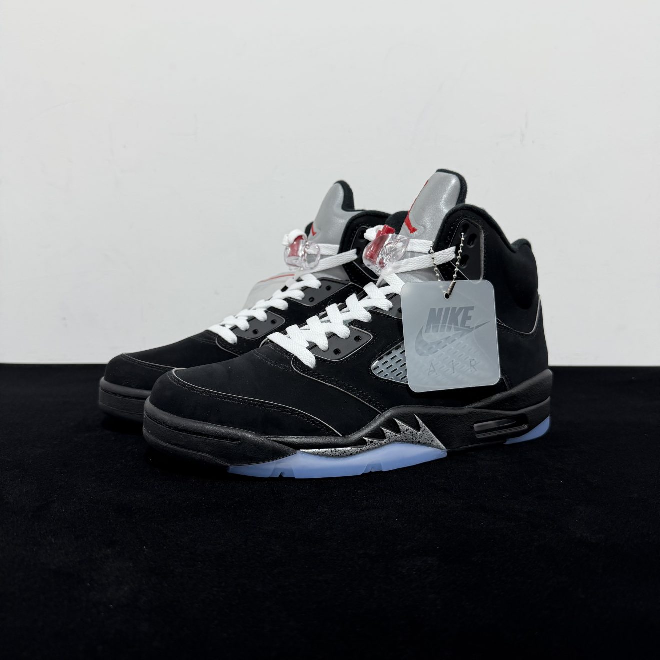 Side view of Jordan 5 Black Metallic Reimagined Reps