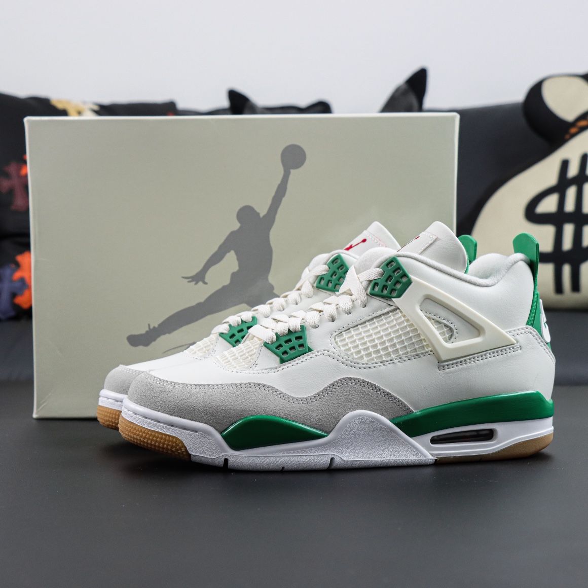 Jordan 4 Pine Green reps with shoebox and metallic green accent