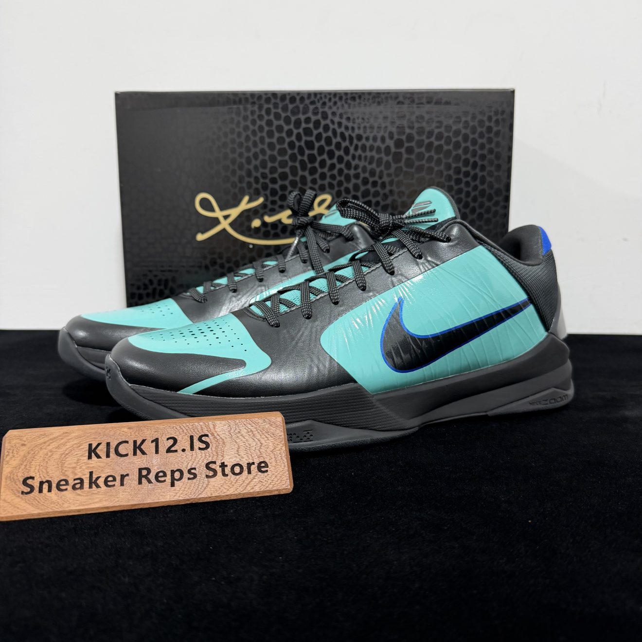 Kobe 5 EYBL The Academy Reps with box displayed on table