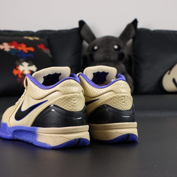 Heel side angle of Kobe 4 Barcelona Reps with low-cut design and padded collar