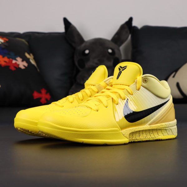 Side view of Kobe 4 CHBL reps showing blue overlays and Swoosh logo