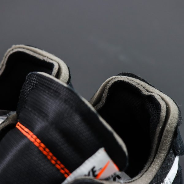 Nike logo on tongue of Off White Air Max 90 Reps with signature zip tie