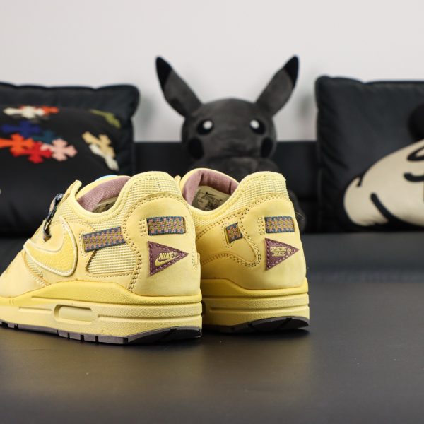 Rear side of Air Max 1 Saturn Gold Reps showing Cactus Jack heel branding