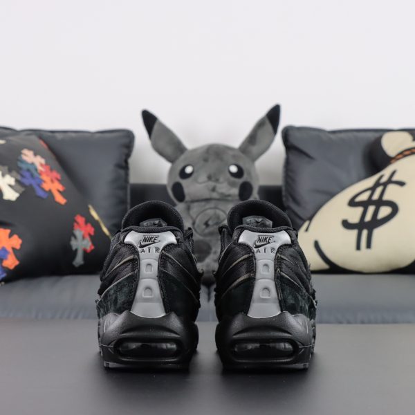 Rear view of CDG Air Max 95 reps with black midsole wrap