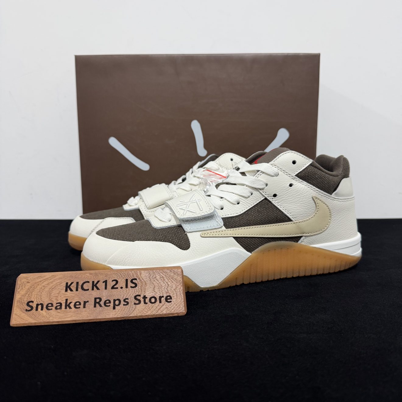 Travis Scott x Jordan Jumpman Jack Sail Reps with box displayed on table