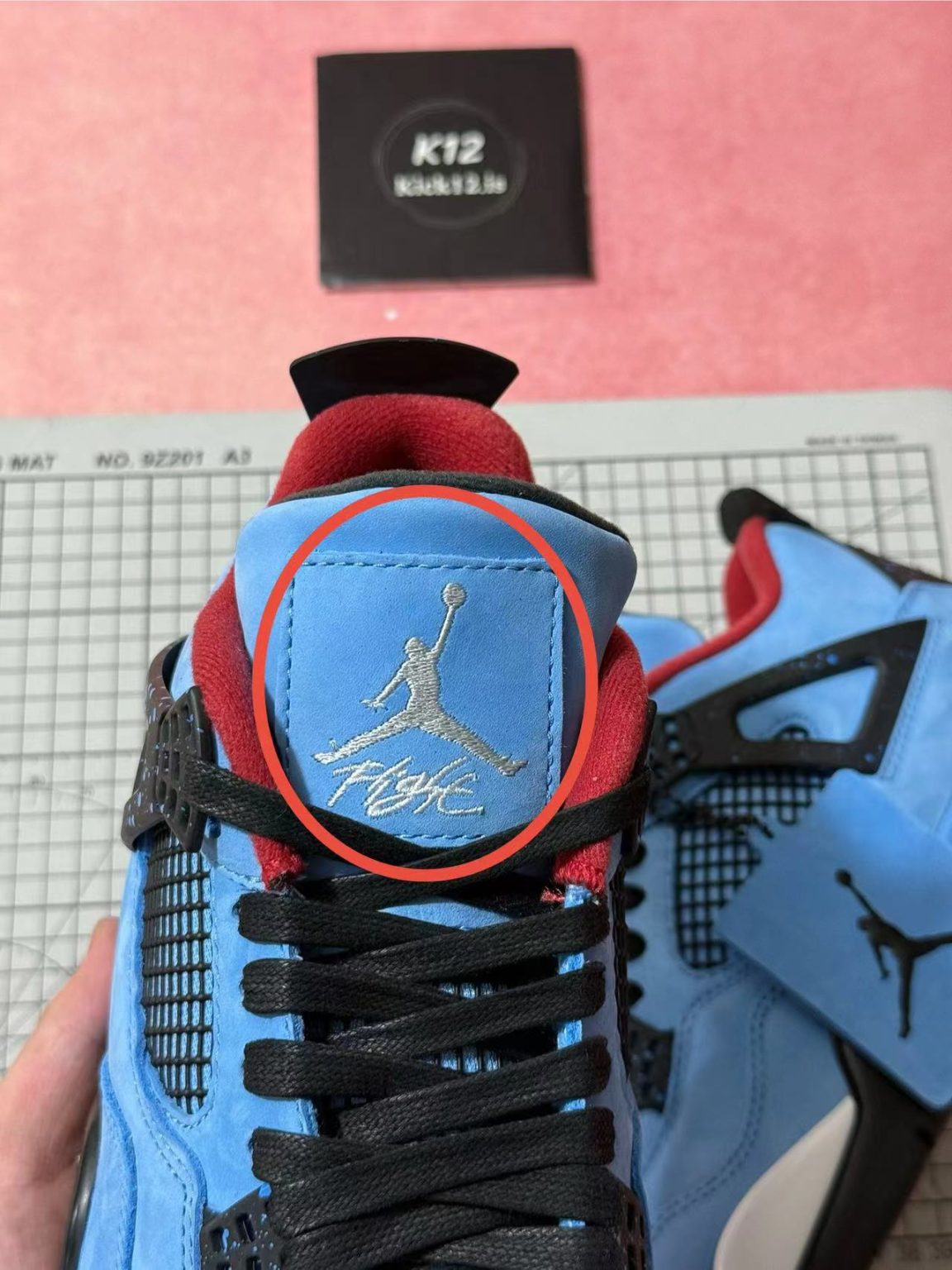 Accurate tongue and heel logo color and placement on Jordan 4 Travis Scott reps