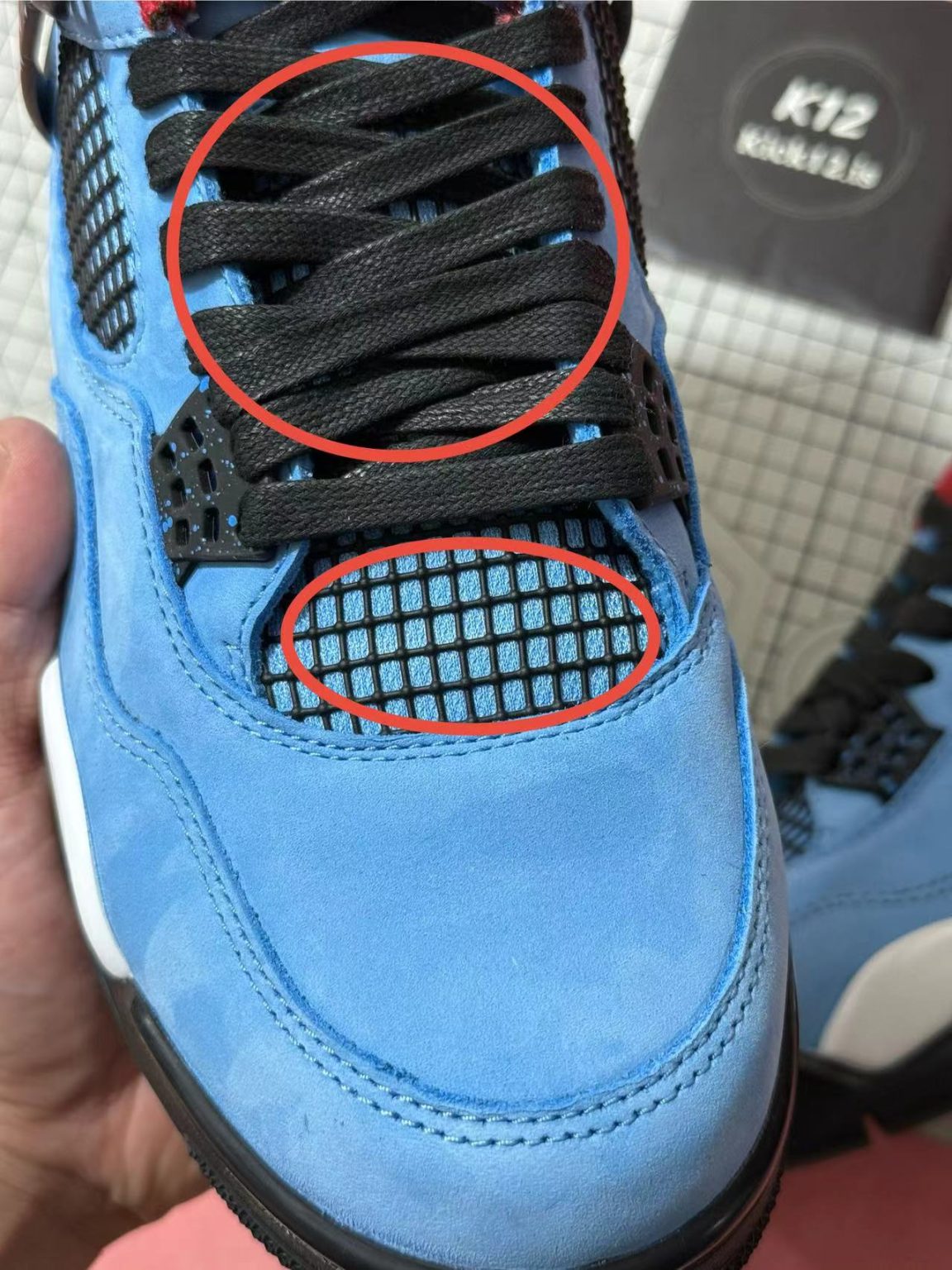 Oiled laces and mesh shine slightly under light on Jordan 4 Travis Scott reps