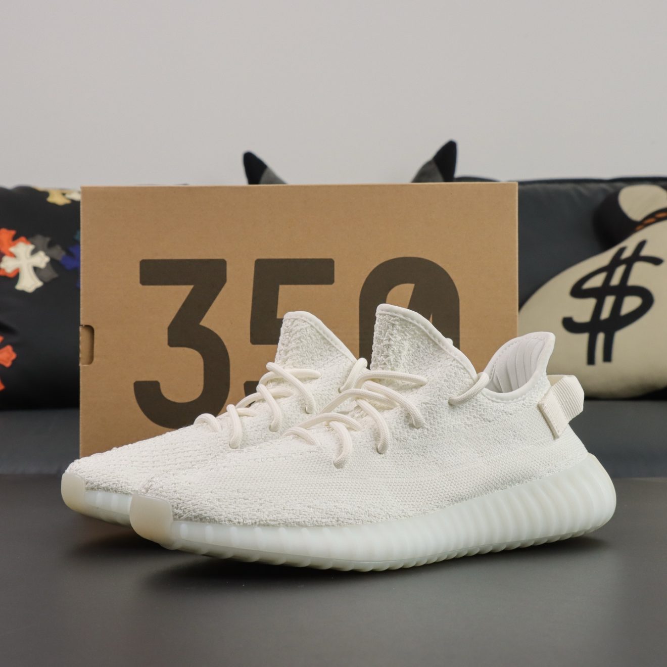 Yeezy 350 Triple White reps with box and full white silhouette