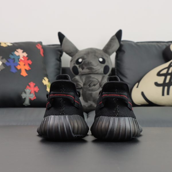 Back heel view of Yeezy 350 Bred reps with red center stitch detail