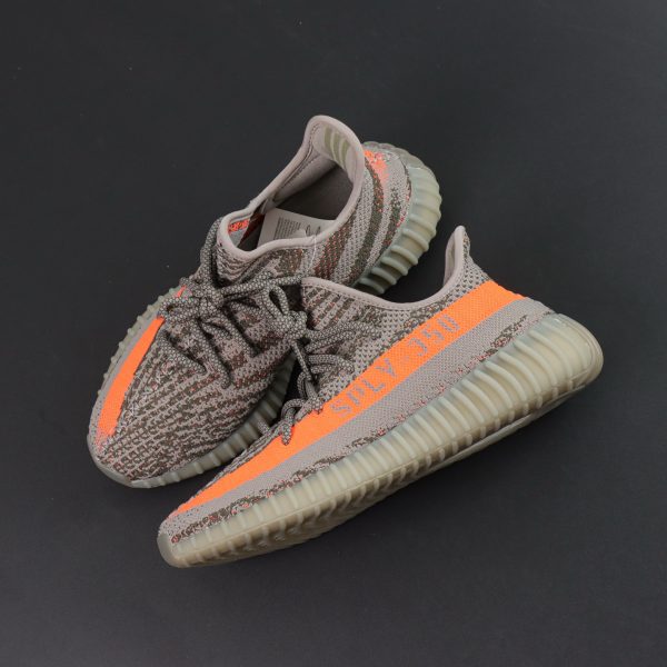 Top-down view of Yeezy 350 Beluga reps with orange stripe and grey upper