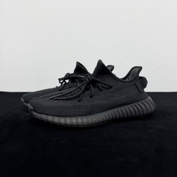 Side view of Yeezy 350 Onyx Reps with black knit upper