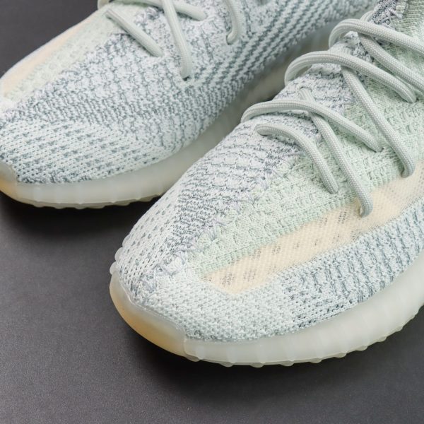 Toebox close-up with seamless knit texture on Yeezy 350 Cloud White