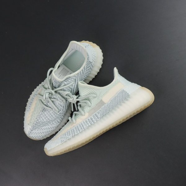 Top view showing knit pattern and tonal laces on Cloud White Yeezy 350