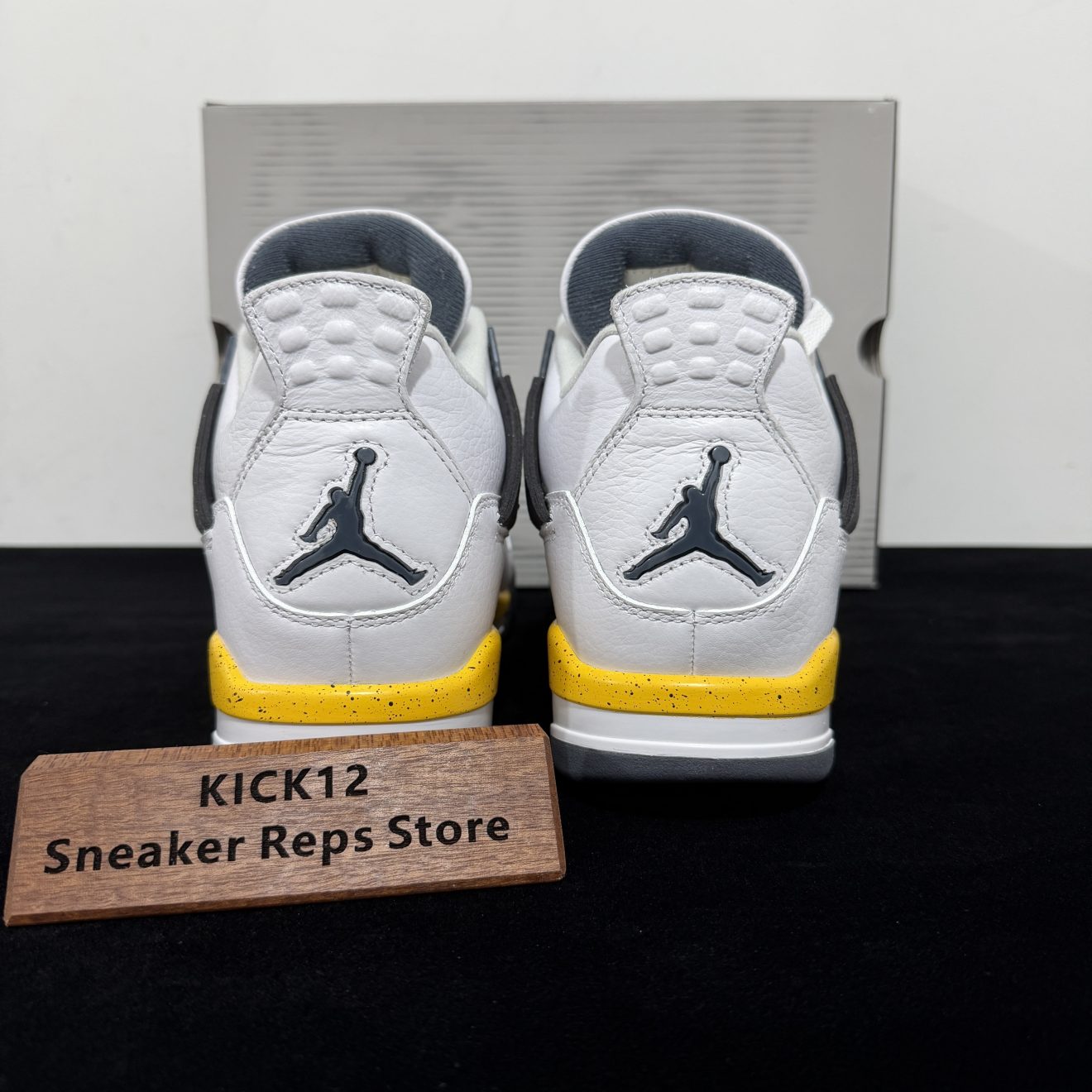 Back heel view of Jordan 4 Rare Air Tour Yellow Reps