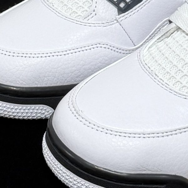 Close-up of toebox on Jordan 4 Rare Air Tour Yellow Reps