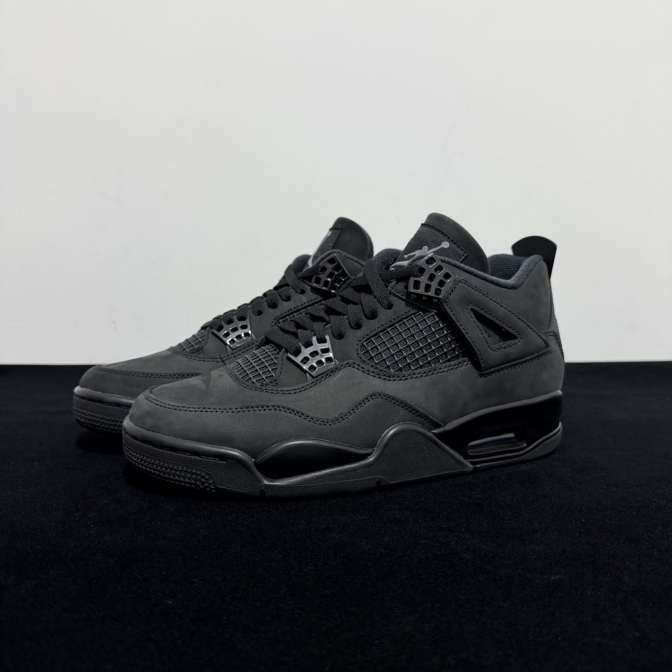 Side view of Air Jordan 4 Black Cat Reps 2025
